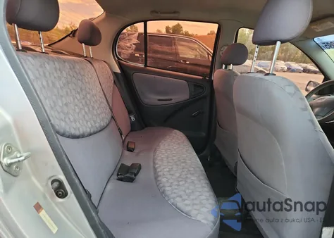 2001 Toyota Echo z USA, uszkodzony, nr VIN JTDBT123110190079